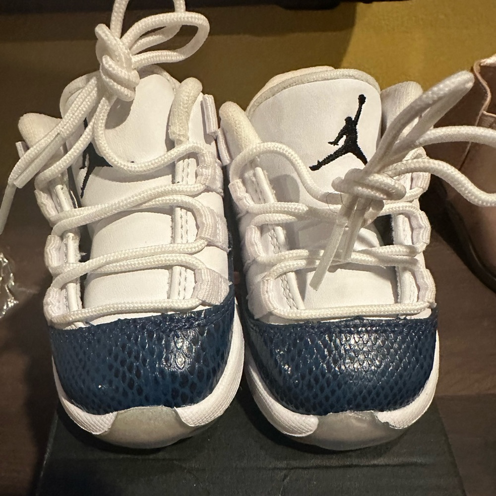 Brand new Jordan 11s snakeskin blue in sz 4 $50